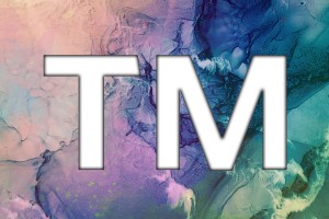 TM symbols on top of an abstract painted background